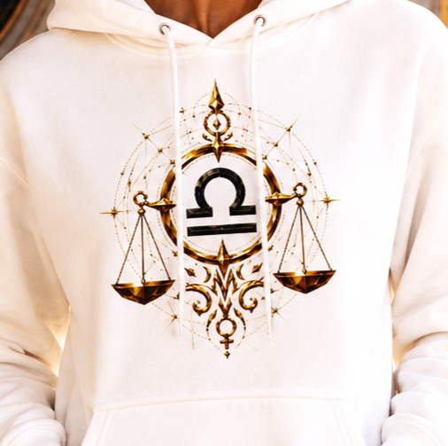 Detalle del Hoodie Blanco Facetas Geométricas Libra con balanza zodiacal